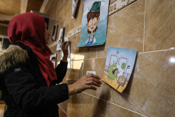 Filistinli genç kız renkli çizimlerle çocuklara koronavirüsü anlatıyor