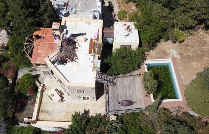 Firari gazeteci Can Dündar'ın villasının havuzu yıkılarak molozla dolduruldu