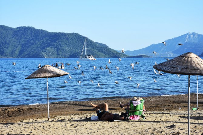 "Yeryüzü cenneti" mavi bayraklı plajlarıyla konuklarını bekliyor