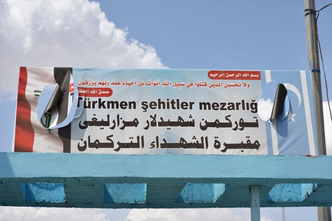 Terör örgütü PKK, Kerkük'te paçavrasını astı ve Türkmen mezarlığına saldırdı