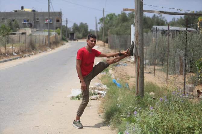 Gazzeli genç, Yeryüzü Doktorları'nın sağlık desteğiyle parkur sporuna dönüyor