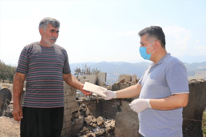 Adana'daki yangında zarar görenlere nakdi yardımların dağıtımına başlandı