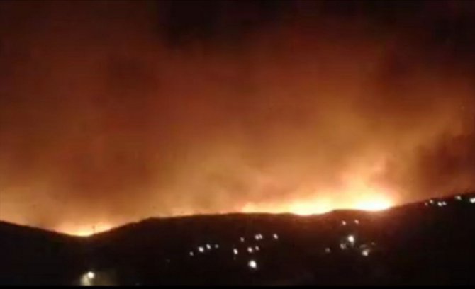 Suriye'de Lazkiye'nin doğusunda başlayan yangını söndürme çalışmaları devam ediyor