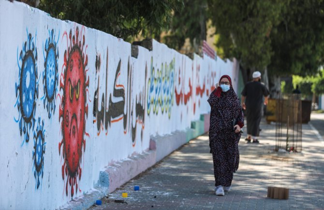 Gazze'de halk, duvar resimleriyle Kovid-19'a karşı bilinçlendiriliyor