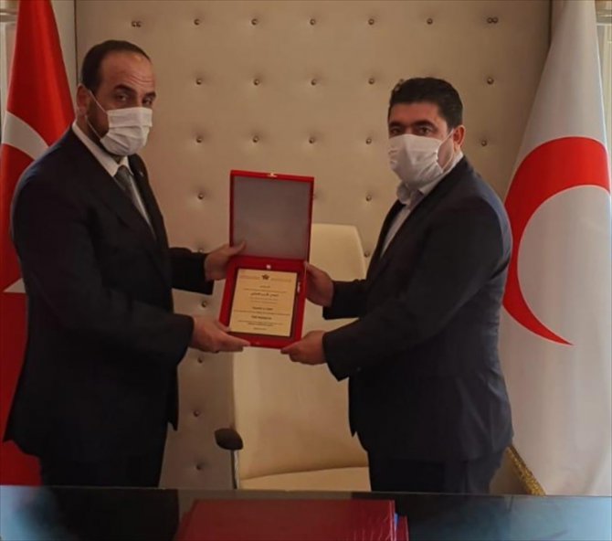 SMDK Başkanı Nasır el-Hariri'den Türk Kızılay şehidinin ailesine ziyaret