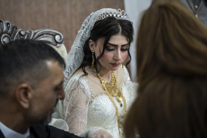 DEAŞ’ın esaretinden 9 yıl sonra kurtarılan Ezidi kadın eşiyle nikah tazeledi